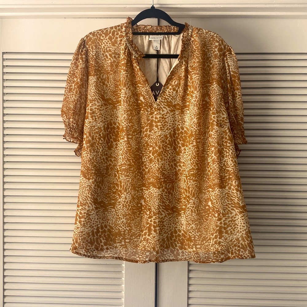 Women’s lined blouse, perfect for fall. Size 1X with original tags
